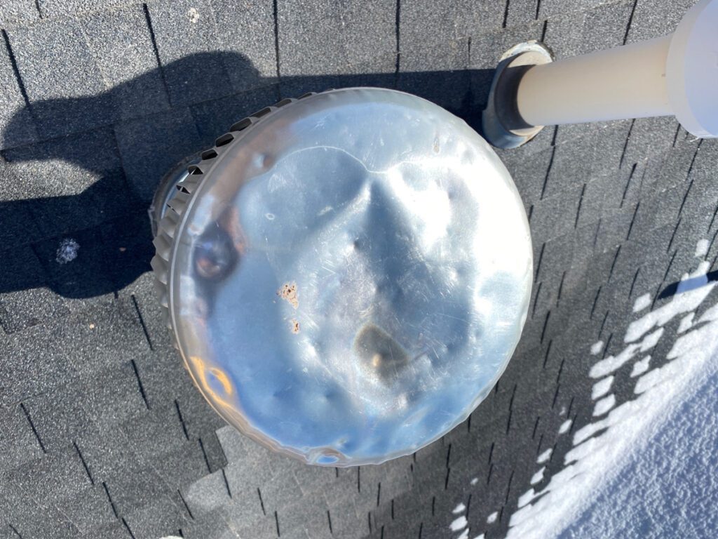 A close up of the top of a street light